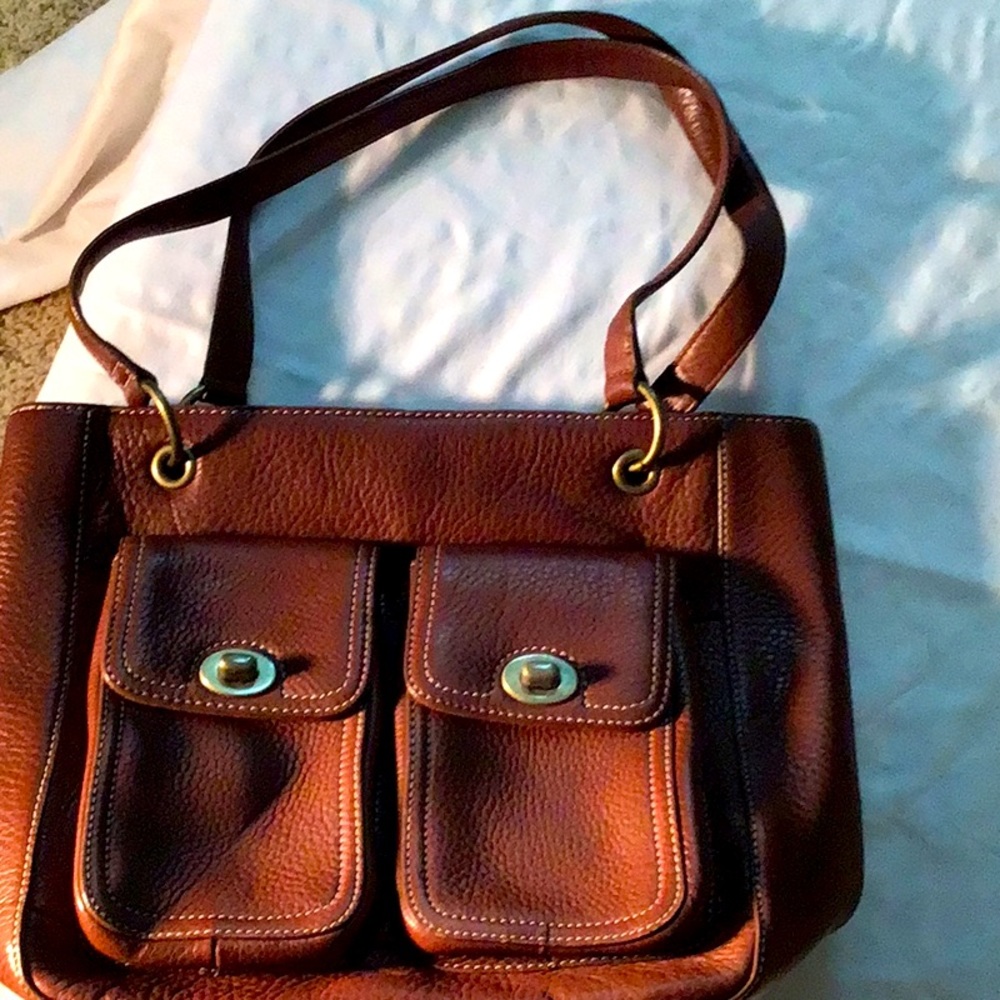 Fossil medium to large size bag to front button